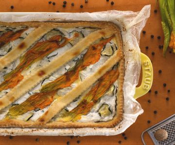 Savory tart with ricotta and zucchini flowers