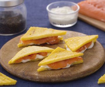 Polenta sandwich with salmon and crescenza cheese