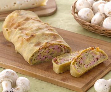 Savory strudel with ham, mushrooms and fontina