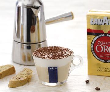 Coffee mousse in cup with cantucci