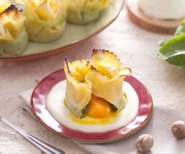 Fresh pasta bundle with molten yolk