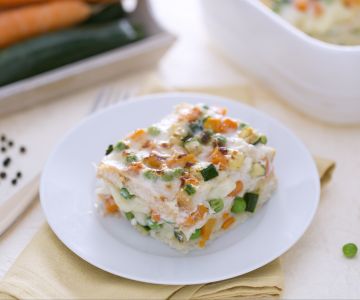 Lasagna with sliced bread, cheese, and vegetable ragù