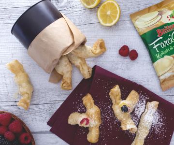 Fried candies with custard and berries