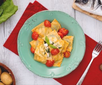 Fish ravioli with cherry tomatoes