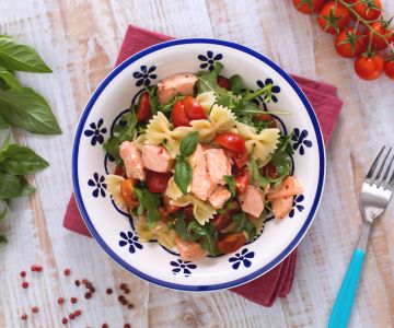 Farfalle with salmon, arugula, and cherry tomatoes