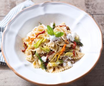 Pasta with asparagus, stracciatella, and zucchini flowers