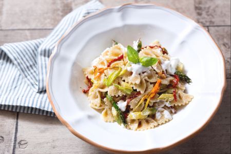 Pasta with asparagus, stracciatella, and zucchini flowers