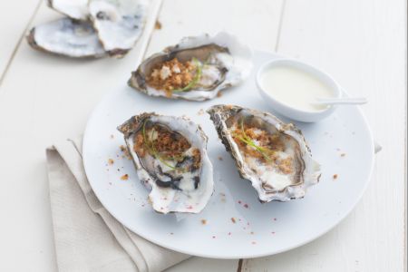 Oysters with champagne and spring onion
