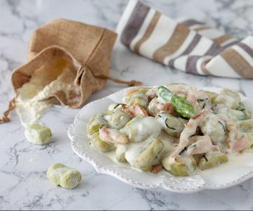 Asparagus gnocchi with burrata cream and bacon