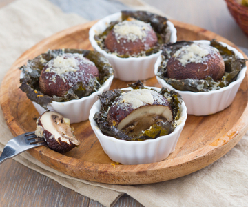 Vine leaf baskets with porcini mushrooms and Grana Padano