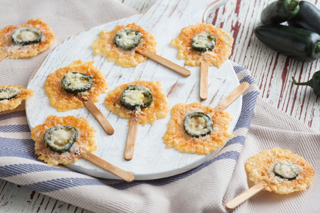 Chili Pepper and Grana Padano Lollipops