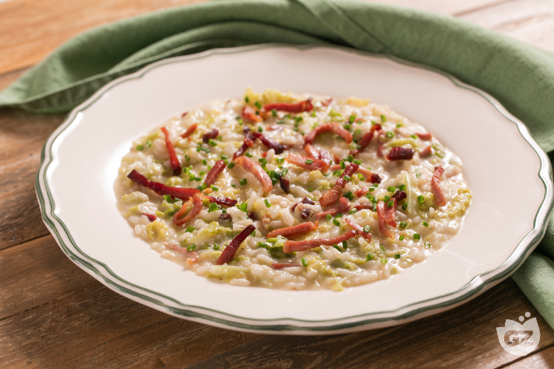 Risotto with Savoy cabbage, speck, and fontina