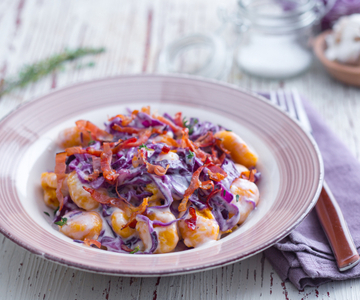 Pumpkin gnocchi with Grana Padano, red cabbage and speck