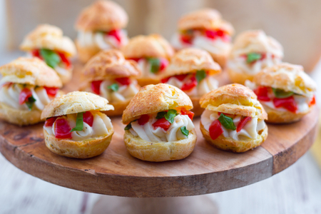 Savory cream puffs with Grana Padano cream
