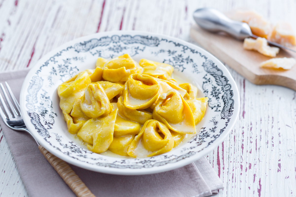 Turmeric Cappellacci with Butter and Grana Padano