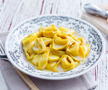 Turmeric Cappellacci with Butter and Grana Padano