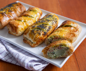 Mini strudels with chard, ricotta, and speck