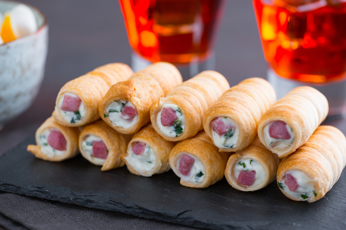 Savory puff pastry rolls with goat cheese and bacon