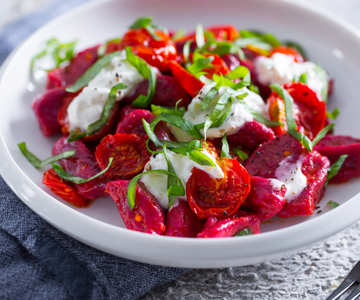 Beetroot gnocchetti with cherry tomatoes and stracciatella