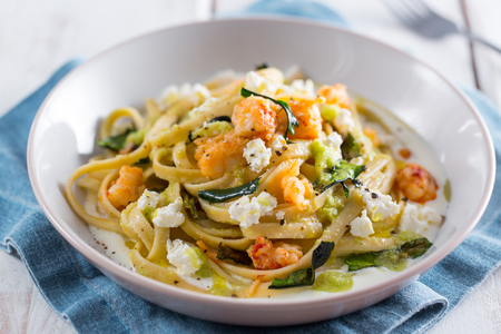 Pasta with robiola cream with shrimp and zucchini