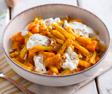 Casarecce with pumpkin, walnuts, and burrata