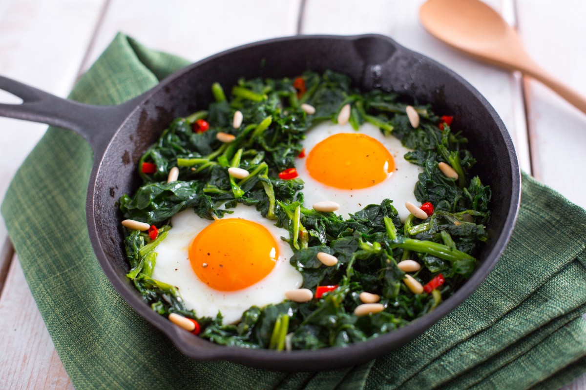 Broccoli rabe and eggs in a pan