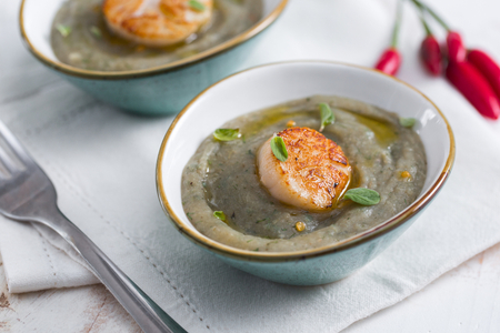 Scallops on Artichoke Cream and Aromatic Herbs