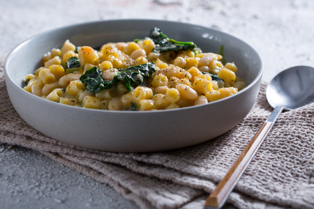 Pasta and beans with black cabbage