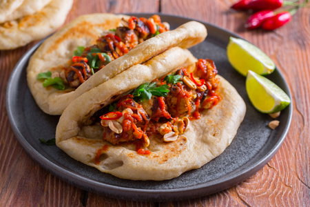 Chicken skewers with pita