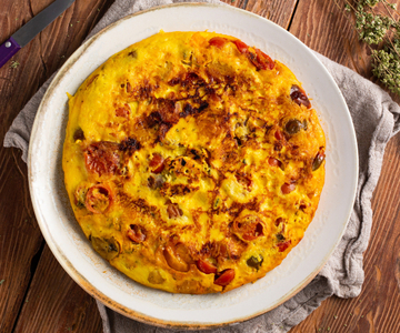 Omelette with cherry tomatoes and pecorino