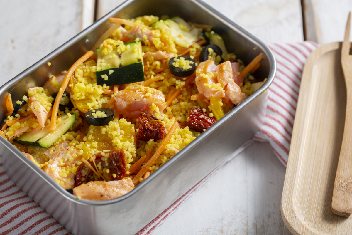 Lunch box with couscous and salmon