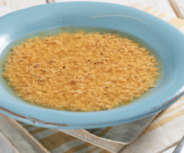 Stracciatella in vegetable broth