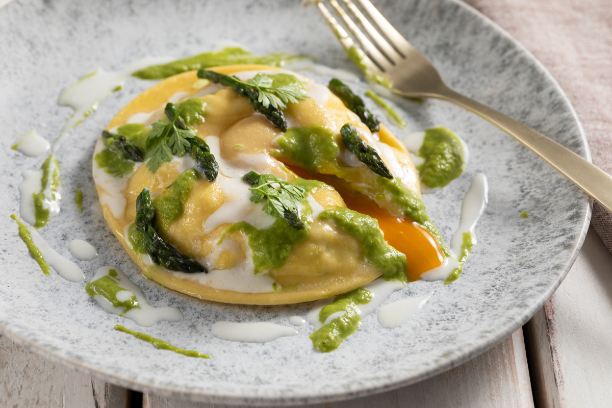 Fondant Egg Yolk Raviolone with Ricotta and Asparagus