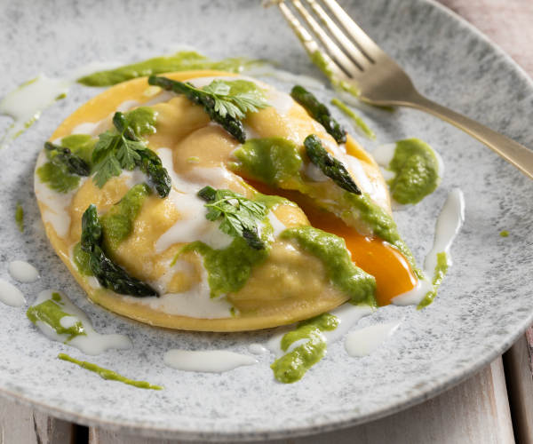 Fondant Egg Yolk Raviolone with Ricotta and Asparagus