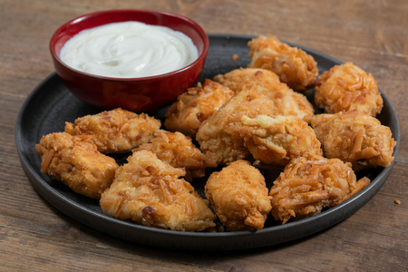Breaded chicken breast with breadsticks