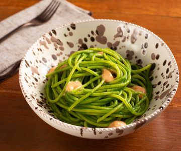 Spaghetti with turnip greens cream, nduja, and stracciatella