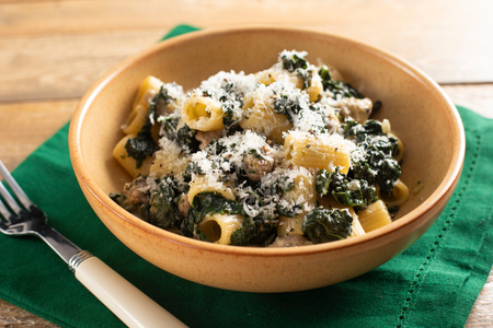 Pasta with sausage and black cabbage