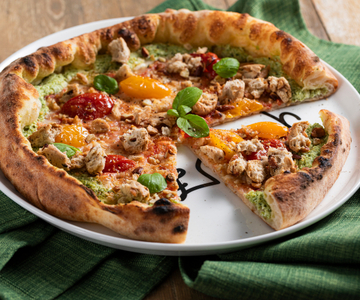 Pizza with stuffed crust of pesto and ricotta