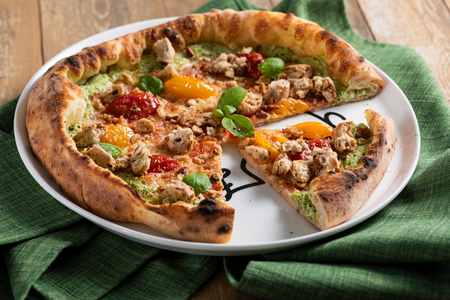 Pizza with stuffed crust of pesto and ricotta