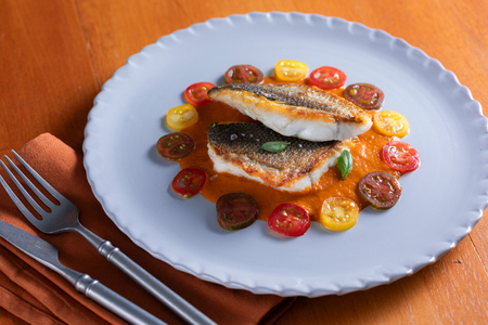 Sea bass fillet with cherry tomatoes