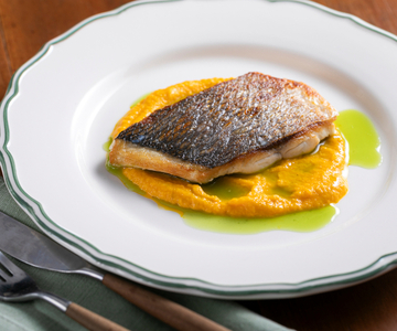 Seared sea bream on carrot cream