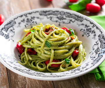 Pasta with pesto and cherry tomatoes