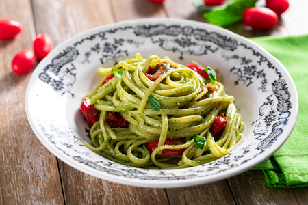 Pasta with pesto and cherry tomatoes