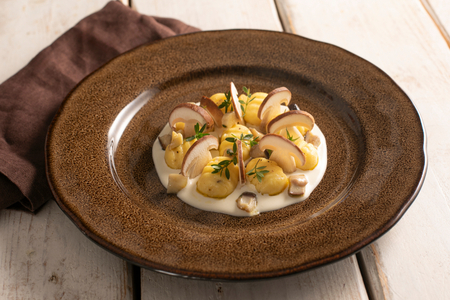 Gnocchi with mushrooms and provola
