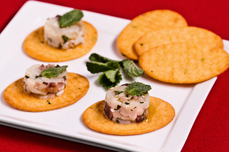 Flatbreads with smoked swordfish tartare and mint