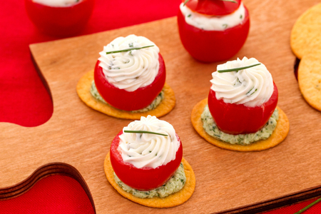 Flatbreads with Cherry Tomato Stuffed with Cheese and Arugula