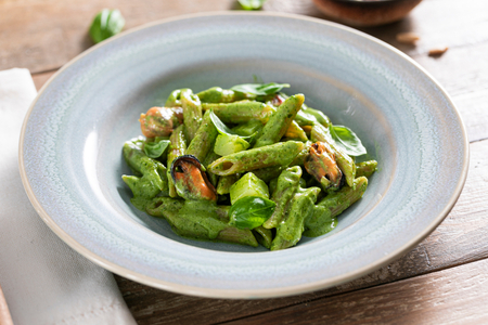 Pasta with pesto, mussels, and potatoes