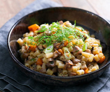 Pasta with clams, pumpkin, and mushrooms