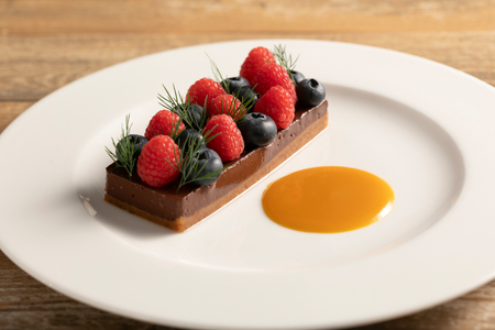 Vegan chocolate and peanut terrine with berries