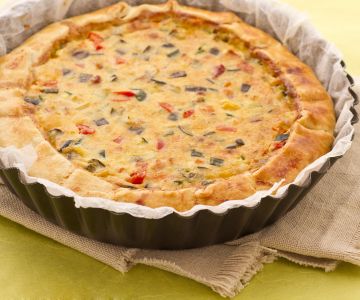 Quiche with vegetables and bacon